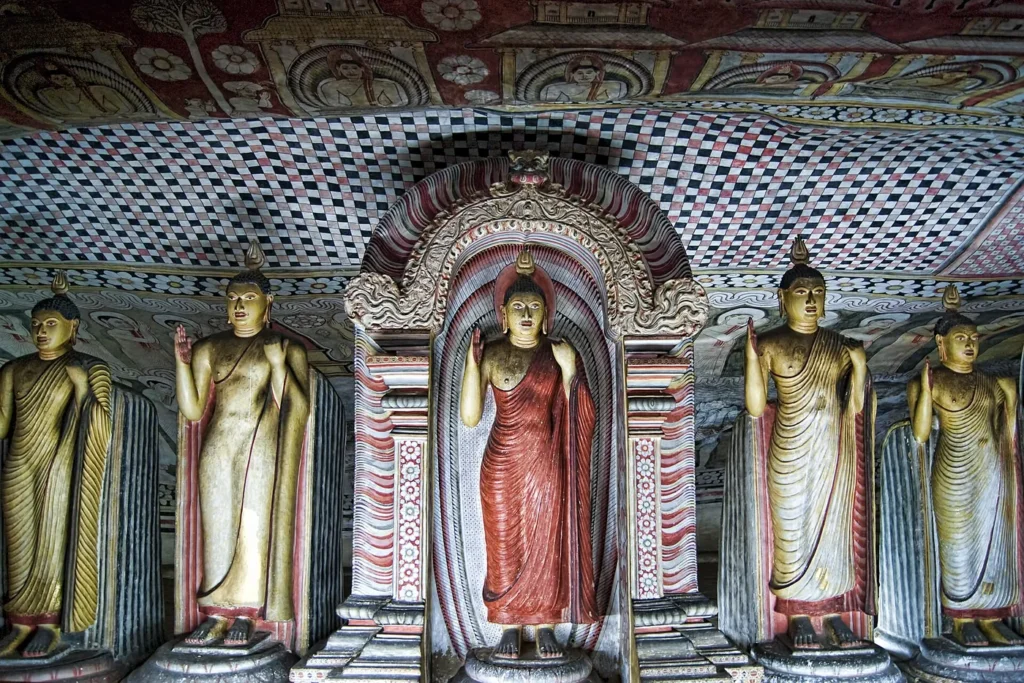 Buddha statues in the Dambulla cave temple, Sri Lanka – Island Walkers